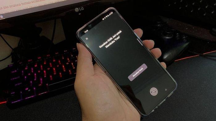Tampilan pemberitahuan ketika aplikasi foto dikunci