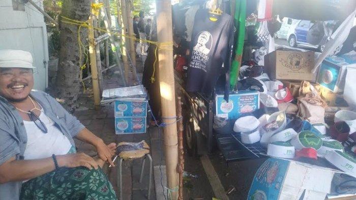 Jelang Reuni 212, Kaus Bergambar Habib Rizieq dengan Slogan Revolusi Akhlak Laris Manis