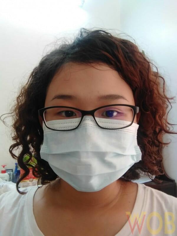 tarik masker Anda lebih tinggi ke atas batang hidung