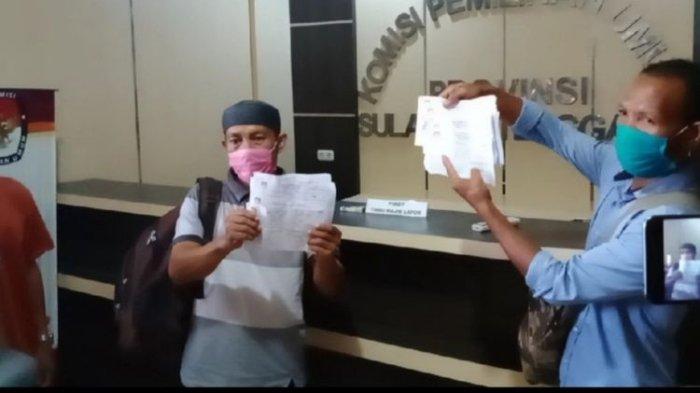 Kades dan perangkat serta belasan warga Desa Matabondu, kabupaten Konawe Selatan, Sultra mengembalikanan surat pemberitahuan memilih pada Pilkada 2020 di wilayah itu ke kantor KPU Provinsi Sultra.