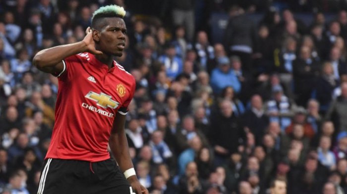 Gelandang Manchester United, Paul Pogba, merayakan gol ke gawang Manchester City di ajang Liga Inggris di Stadion Etihad, Manchester, Sabtu (7/4/2018).